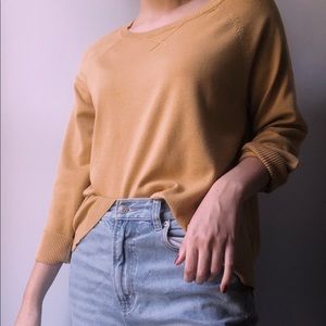 Yellow pullover sweater
